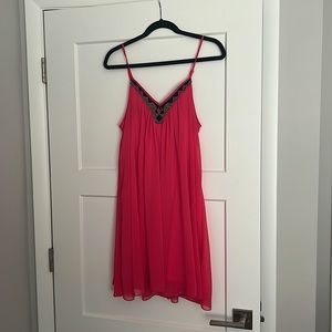 Bright pink dress with beaded neckline